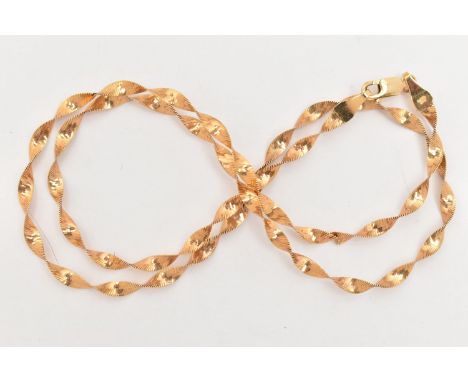 A 9CT GOLD ITAILIAN YELLOW GOLD TWIST CHAIN, flat articulated herringbone twist chain, fitted with a lobster clasp, stamped 9
