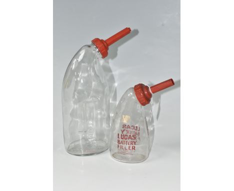 TWO LUCAS BATTERY FILLER GLASS BOTTLES, each with red spout, the smaller bottle printed with 'Lucas Battery Filler' in red, t