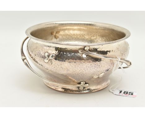 AN EDWARDIAN SILVER BOWL, hammer effect bowl with embossed shamrock and applied vine detailing, hallmarked 'Levi &amp; Salama