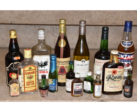 ALCOHOL, A Collection of Old Alcohol to include Sainsbury's Vodka, Harvey's Bristol Cream and Q.C Sherry, Cinzano, two bottle