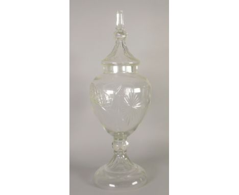 APOTHECARIES LARGE CUT GLASS PEDESTAL JAR AND COVER with cut decoration and spire finial, 31" (78.7cm) high