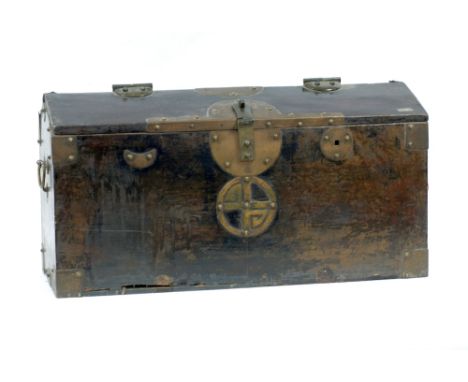 CHINESE BRASS BOUND SOFTWOOD BOX, with half hinged top, side handles and lock plae and clasp, enclosing a compact mounted int