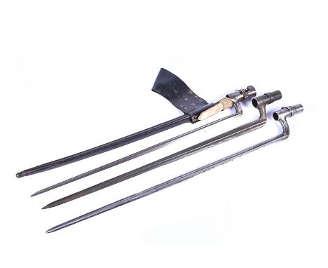 Three Belgium and Austrian Socket bayonets, one with scabbard and frog, with serial 1324, the other two with cruciform blades