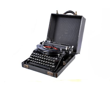 A Smith Premier Noiseless typewriter, in carry case