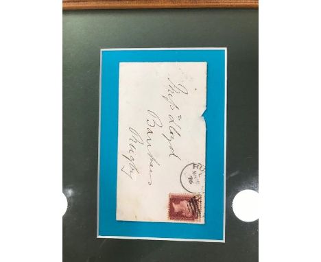 A collection of stamps and First Day Covers, including an 1876 envelope in a frame, a folder of FDCs and four mint stamp sets