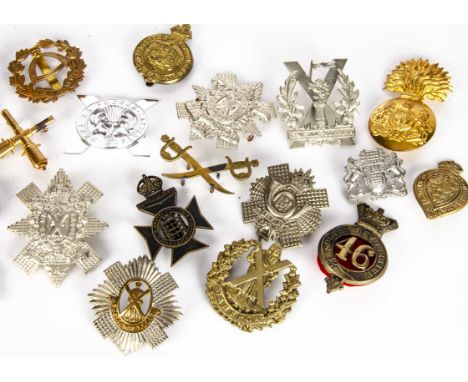 A small group of Scottish Cap badges, including 1st VB (Glasgow) Highland Light Infantry, Highland Cyclist Battalion T.F, Gla