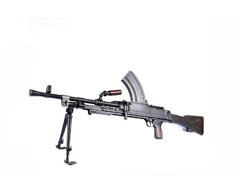 A Deactivated Enfield Bren MkIII .303 light machine gun, post War dated 1957, with moving trigger, selector, cocking handle a