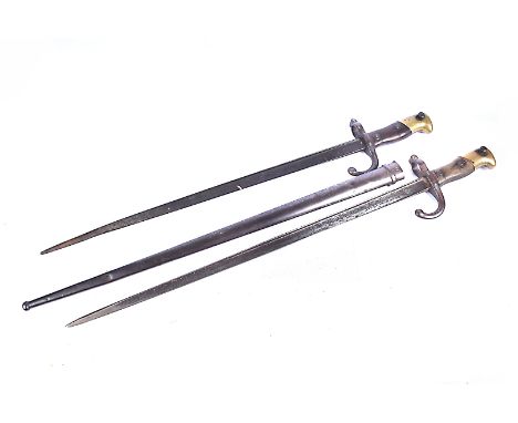 A French Gras, dated 1876, serial worn, complete with scabbard, together with another French Gras, undated, stamped 35213, no