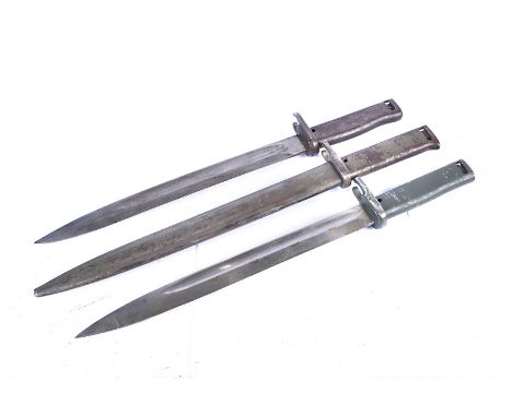 Three German Ersatz bayonets, one marked 6456, one also with scabbard