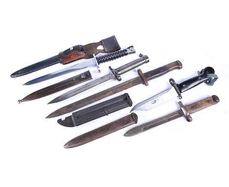 A Swiss Sig knife bayonet, complete with scabbard and frog, frog stamped A.Egger Waldkirch 81, together with a selection of o
