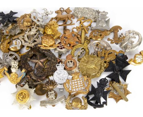 A collection of British cap badges, approx 50, comprising Royal Dublin Fusiliers, 1st Wiltshire R.V, 3rd Gloucestershire Volu