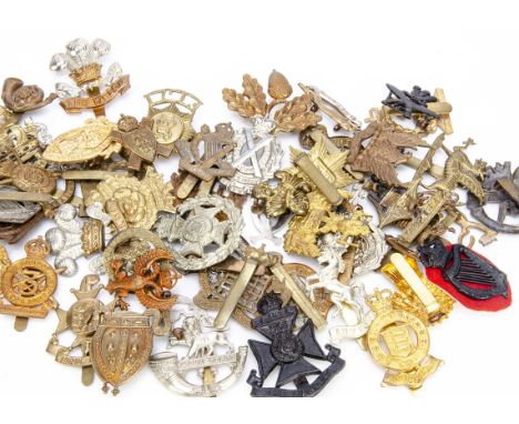 An assortment of approx 50 British cap badges, including North Irish Horse, 3rd City of London Yeomanry, Duke of Lancaster's 