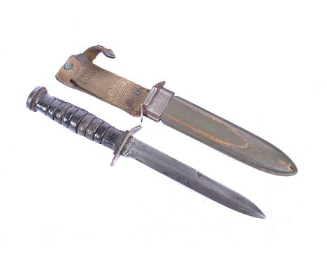 A rare American M3 Fighting knife by Robeson Cutlery &amp; Co, the blade being marked U.S. M3 R.C.CO, complete with a US M8 B