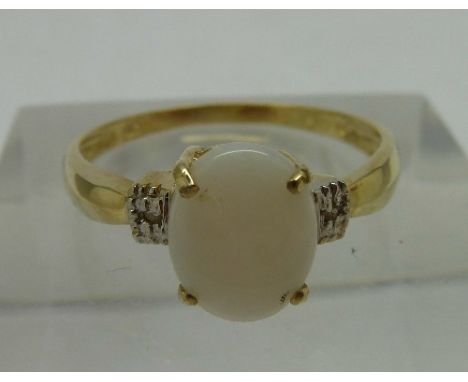 A 9ct gold, opal and diamond ring, weight 1.2g, size O