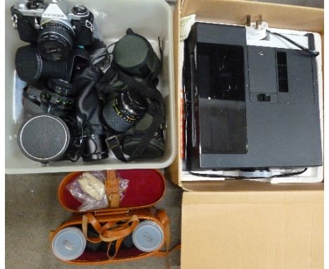 A Pentax ME Super camera, four lenses, a slide projector and a pair of 7x35 binoculars