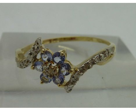 A 9ct gold, amethyst and diamond ring, weight 1.0g, size O