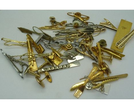 Assorted tie pins and cufflinks