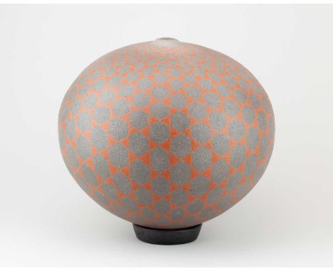 ILONA SULIKOVA (born 1949); a raku vessel decorated with an orange and grey hexagon pattern, height 25cm (excluding clay ring