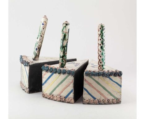 Three raku slices of cake with candles, impressed BP marks and painted 'NPA Camp 10' (presumably to mark the Northern Potters