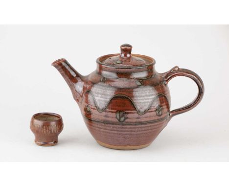 † RAY FINCH (1914-2012) for Winchcombe Pottery; a stoneware teapot with meander decoration, impressed WP. mark, height 16cm, 