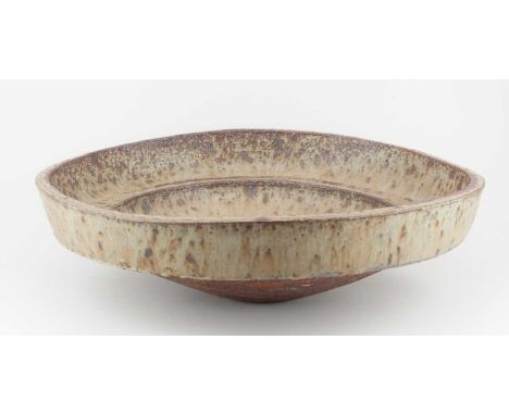 † JENNY WELCH (1940-2023); a large stoneware bowl covered in oatmeal glaze with iron staining, diameter 50.5cm.  Provenance: 