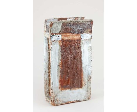 † ROBIN WELCH (1936-2019); a large rectangular stoneware slab form with winged top and textured surface partially covered in 