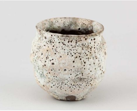 † AKI MORIUCHI (born 1947); a stoneware cup with heavily textured surface, impressed mark, height 9cm.Provenance: Estate of R