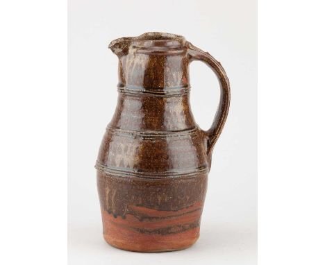 JIM MALONE (born 1946); a stoneware jug covered in iron and green ash glaze with banded decoration, impressed JM and L (for L