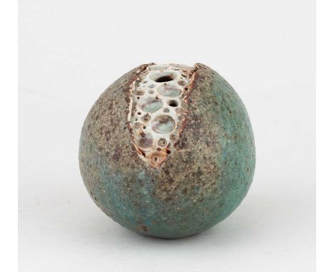 † ALAN WALLWORK (1931-2019); a small stoneware split pebble form partially covered in turquoise glaze with iron staining, inc