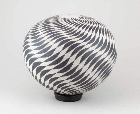 ILONA SULIKOVA (born 1949); a raku vessel decorated with a black and white wave pattern, height 25.5cm (excluding clay ring s
