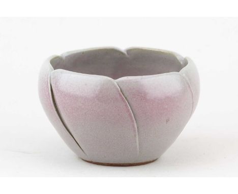 † CHARLES VYSE (1882-1971); a stoneware lotus bowl covered in grey glaze with pink blushes, incised signature, diameter 11cm.