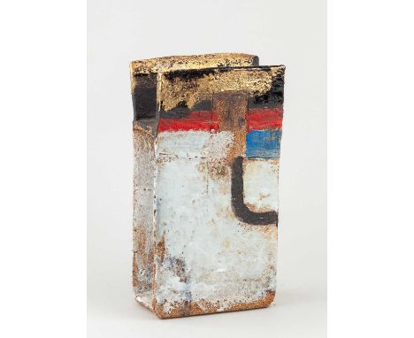 † ROBIN WELCH (1936-2019); a rectangular stoneware slab form with winged top covered in bands of white, blue and red glaze wi