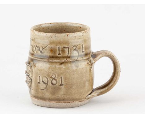 † RICHARD BATTERHAM (1936-2021); a stoneware commemorative mug covered in green ash glaze inscribed 'The Great Fire 1731. Bla