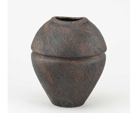 † CHRIS CARTER (born 1945); a stoneware vessel with textured surface covered in bronze glaze, impressed CCP mark, height 18.5