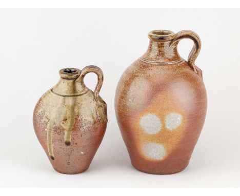 † JOHN LEACH (1939-2021) for Muchelney Pottery; a stoneware flagon partially covered in running green ash glaze, impressed JH