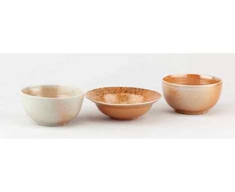 † JENNY WELCH (1940-2023); a pair of small porcelain bowls covered in shino and ash glaze, impressed JK (K for Knowland) mark