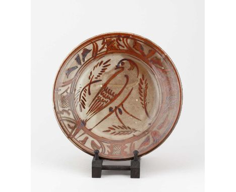 † SETH CARDEW (1934-2016) for Wenford Bridge Pottery; a stoneware plate decorated with a bird, impressed SC and pottery marks