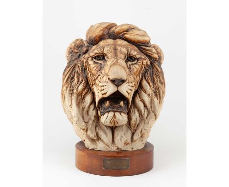 † REGINALD PRICE (born 1926); 'Lion', a limited edition stoneware sculpture on a wooden base washed with iron oxide, edition 