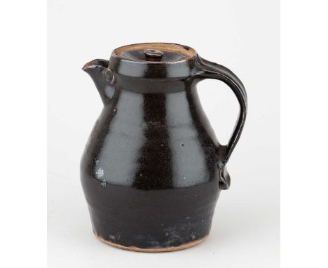† WILLIAM MARSHALL (1923-2007) for Leach Pottery; a stoneware coffee pot covered in tenmoku breaking to kaki glaze, impressed