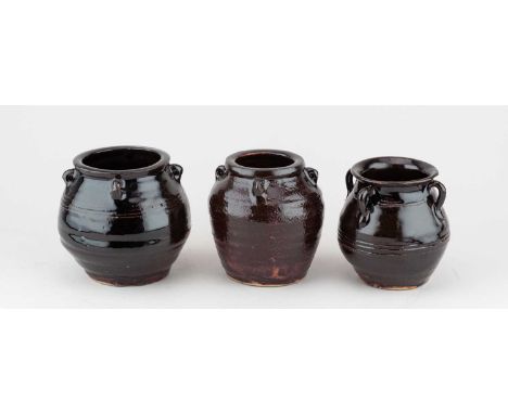 † SYLVIA HARDAKER (1930-2023) for Leach Pottery; a trio of stoneware jars with lug handles, impressed SH and pottery marks, t