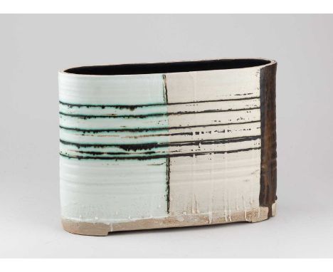 † SAM HALL (born 1967); a large stoneware flat form covered in blocks of white, cream and bronze glaze with incised decoratio