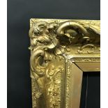 19th Century English School. A Gilt Composition Frame with swept and pierced centres and corners,