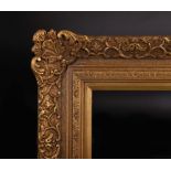 20th Century English School. A Swept Gilt Composition Frame, 30" x 25" (rebate).