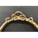 19th Century English School. A Gilt Composition Frame with Ornate top, Oval, 16.75" x 13.5" (