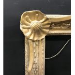 18th Century English School. A Carved Giltwood Swept Frame, 18" x 12.75" (rebate).