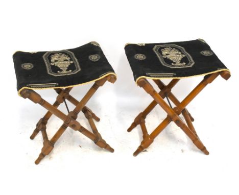 A pair of beech folding stools, with applied tapestry decorated with Grecian urns, height 53cm.