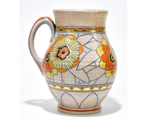 CHARLOTTE RHEAD FOR CROWN DUCAL; a vase decorated with flowers in shades of orange and yellow against a sponged ground, with 