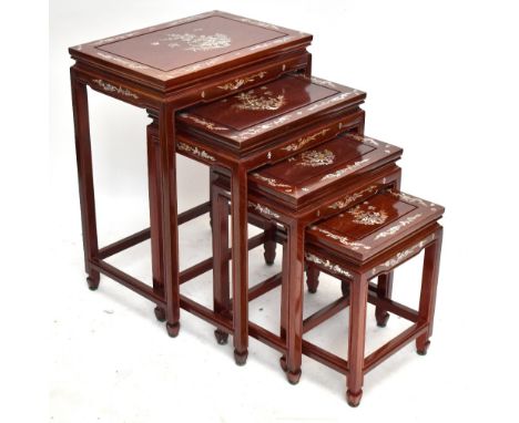 A Chinese nest of four graduated rosewood coffee tables with mother of pearl inlaid detail, width 51cm, depth 35cm, height&nb