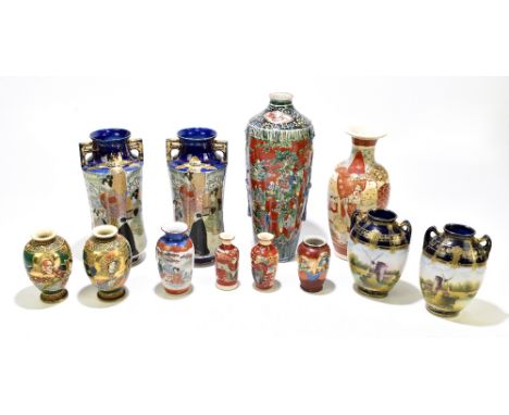 A group of 20th century Japanese ceramics including a pair of Noritake windmill decorated twin handled vases, height 16cm, a 