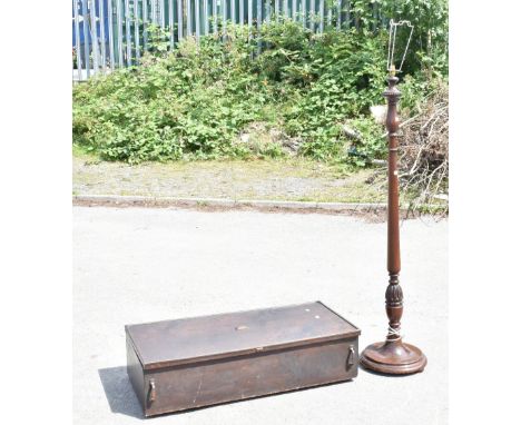 An early 20th century mahogany standard lamp with carved baluster section, height 152cm, together with an oak effect blanket 